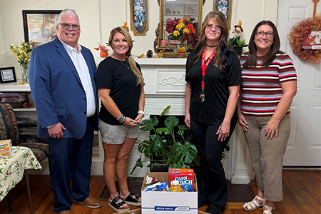 Pictured left to right: Dr. Ricky Tompkins, UAHT Chancellor; Sherry Hamilton, HIA Director; Caley Tucker, Hempstead Hall Assistant Director; Jessica Beaver, Hempstead Hall Director.